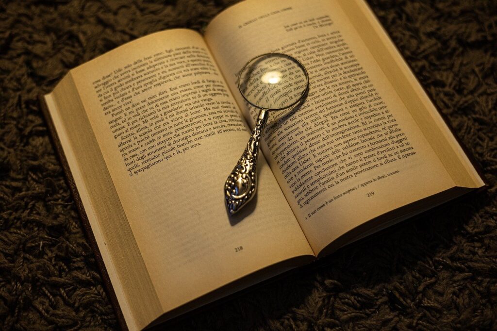 magnifying glass, book, old book